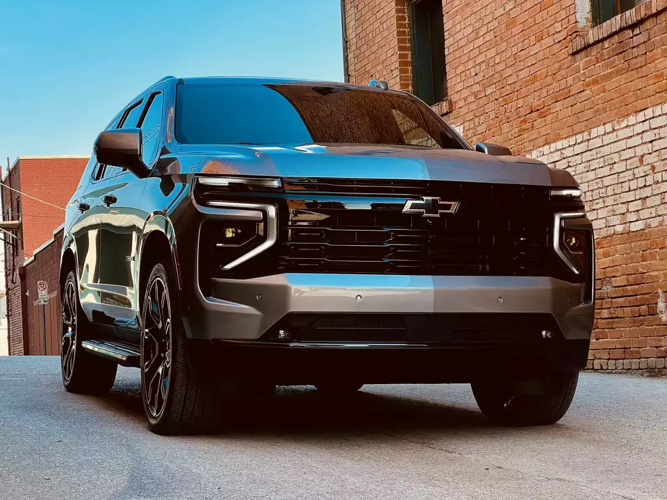 Black luxury Chevrolet SUV parked in downtown Cleveland